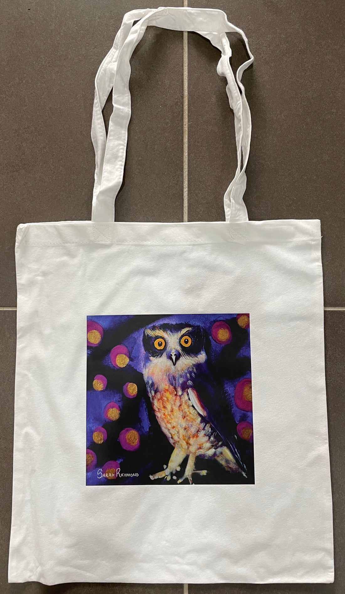 White bamboo tote bag with colourful abstract realism print of an owl on abstract background